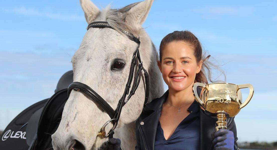 Michelle Payne holding the Melbourne Cup