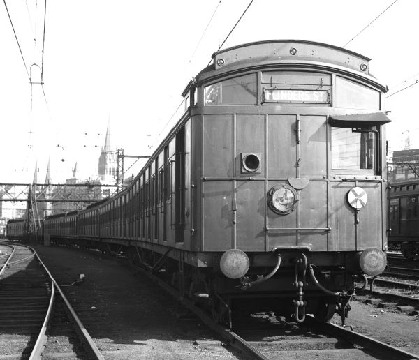 Black and white image of an old wooden Melbourne train