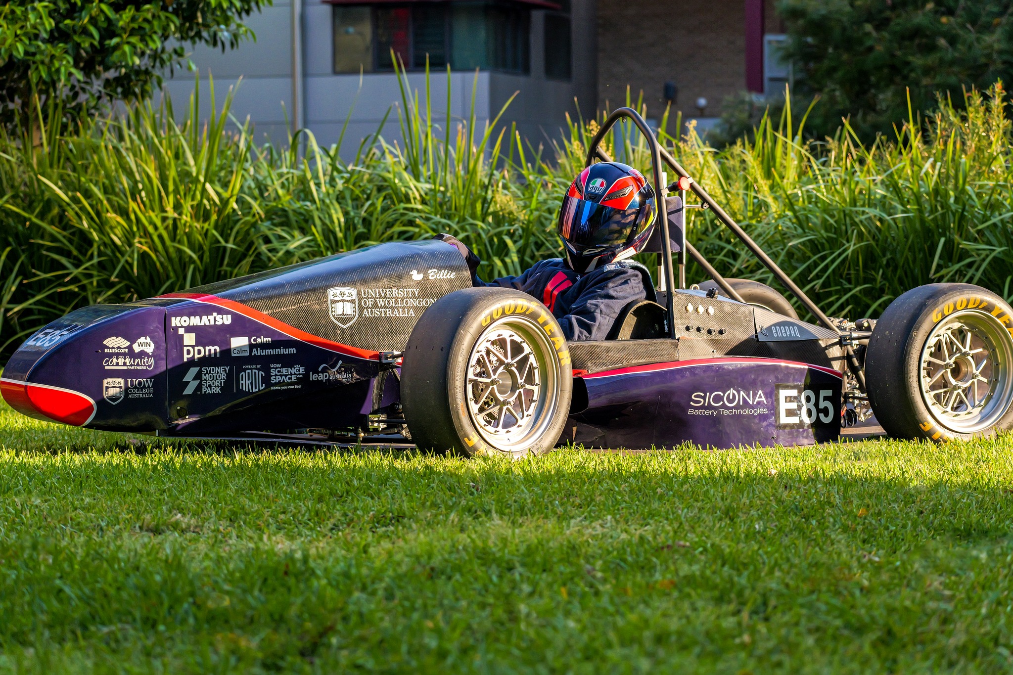 Image of Formula one style car with driver 