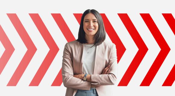 Woman in front of red chevron background